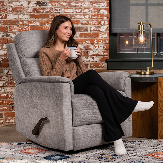 Woman sittinbg in Flexsteel compact recliner